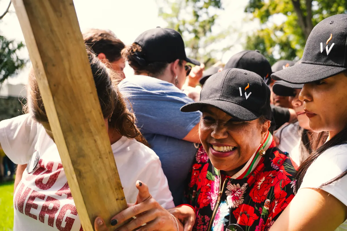 Participants embracing during a team-building dynamic